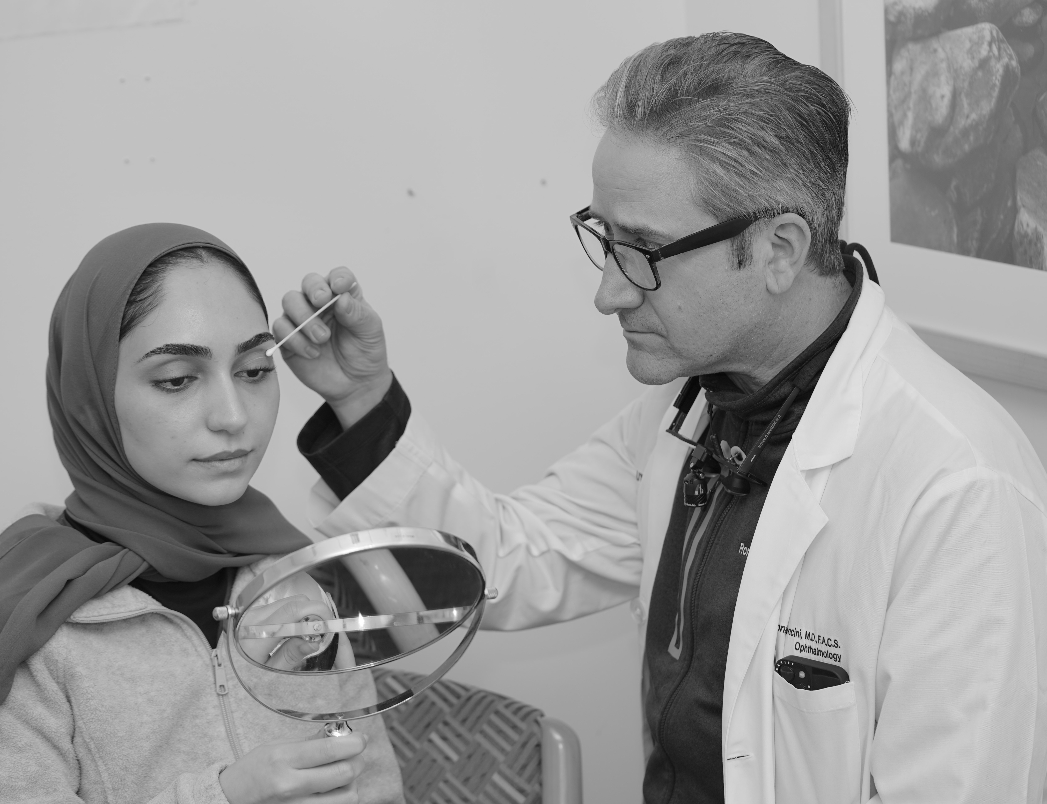 Dr. Ronald Mancini in consultation